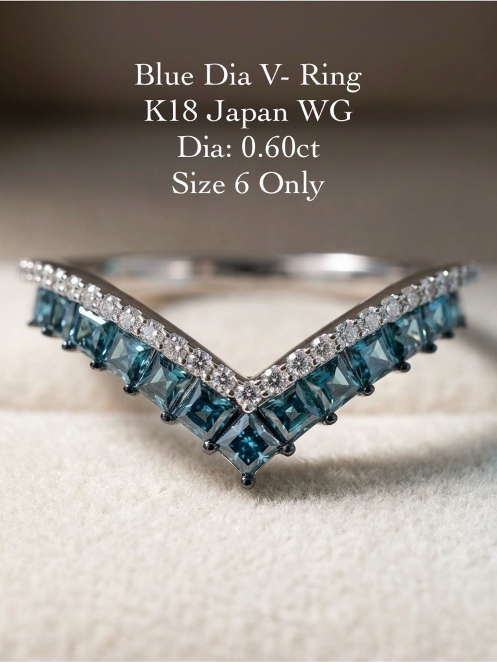 Blue Diamond V-Shape Ring in White Gold